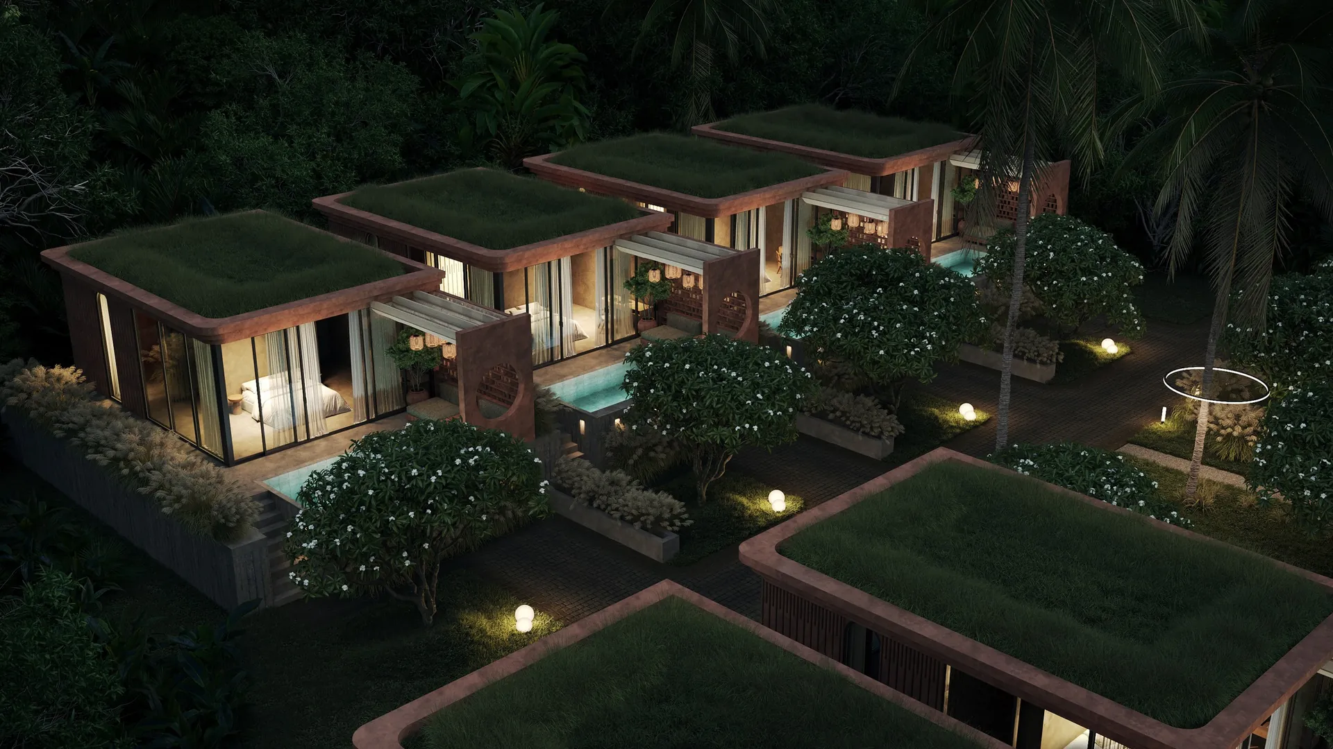 Ardhana Fengshui villas with green roofs, from above at night